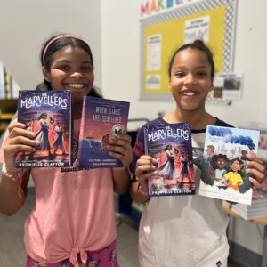 Students From Talley Street Upper Elementary School Posing With The Books They Chose At The True Book Fair.