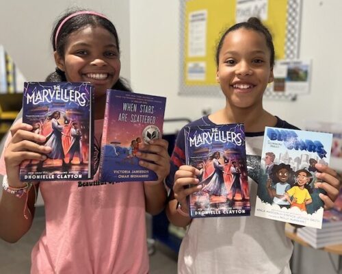 Students From Talley Street Upper Elementary School Posing With The Books They Chose At The True Book Fair.